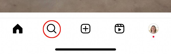 Bottom navigation for Instagram app with the Explore icon pointed out.