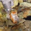 Why did rocks from the bottom of the Pacific catch fire in a lab?