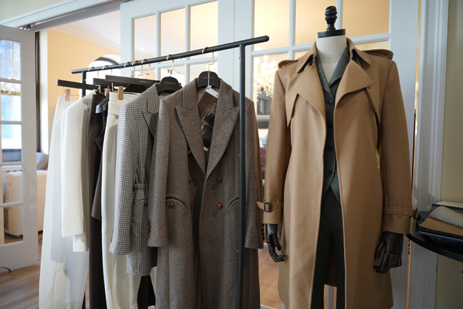 Samples of Kutetailor clothing hanging on a rack