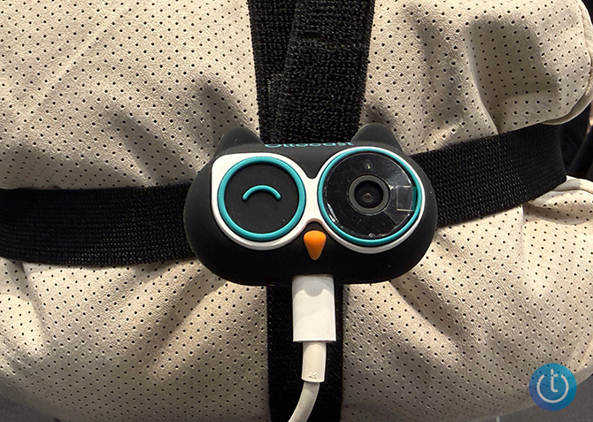 Ottocast Cabin Care Wireless Rear-Seat Camera shown attached to the back of a headrest mockup