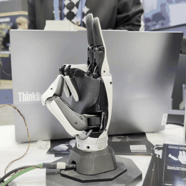 Moving gif showing fingers of robotic hand moving synchronously