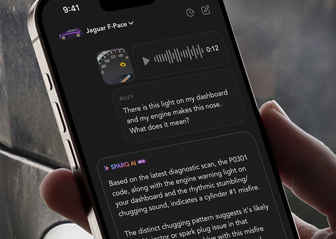 A phones shows a screenshot of a conversation someone is having with the Sparq app as their car is being serviced
