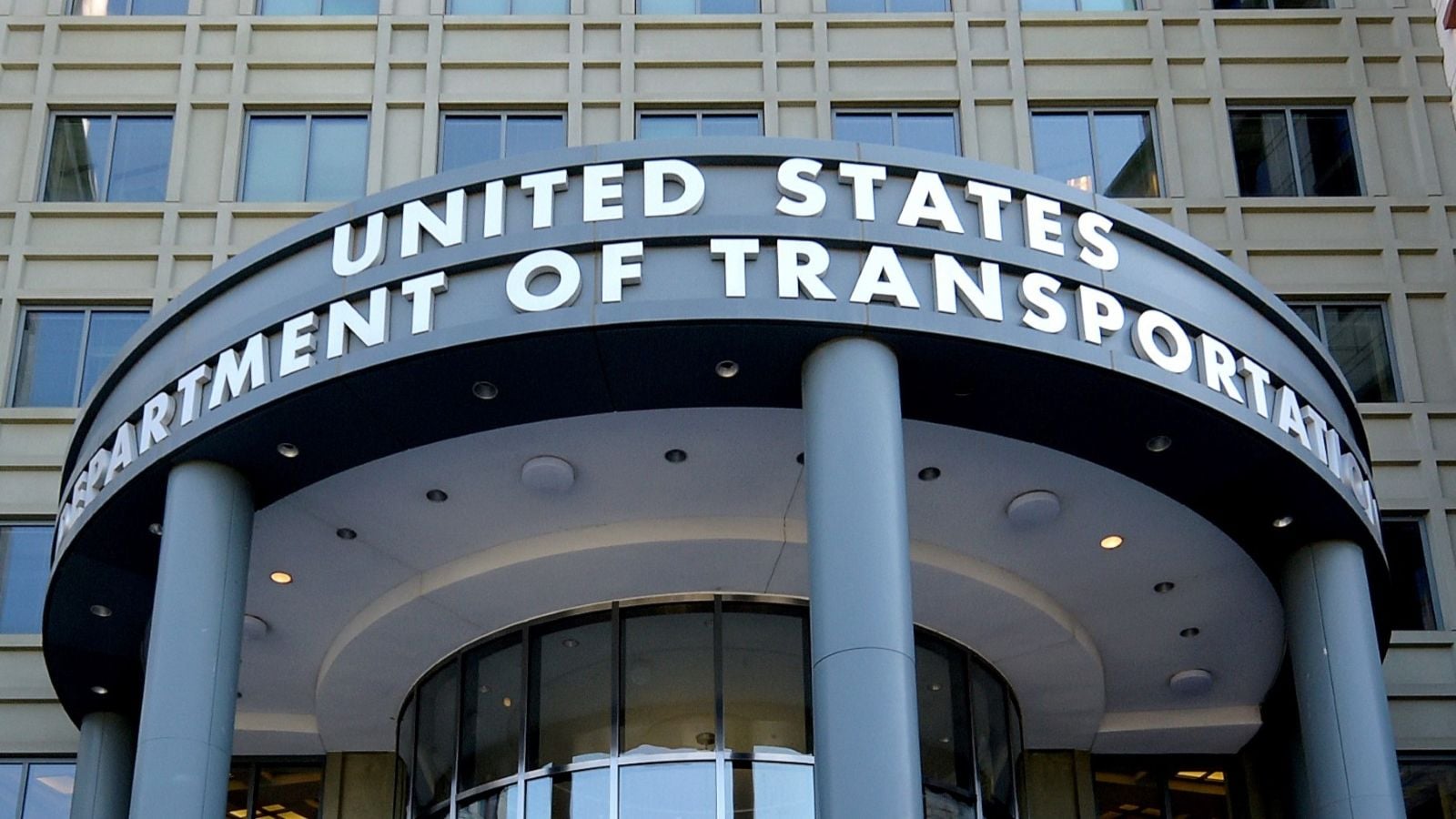 US Department of Transportation headquarters showing name on outside of building.