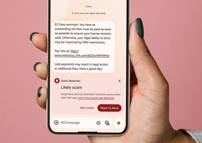 Android phone shows screenshot of Android 16 scam text protection on the display.