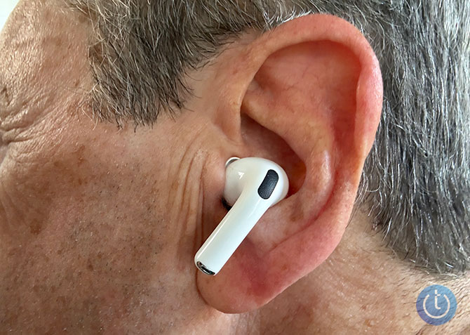 The Apple AirPods Pro 3 is shown in ear