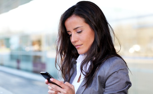 Business woman on a smartphone