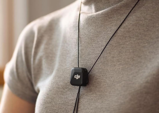 DJI Mic Mini transmitter worn on a lanyard