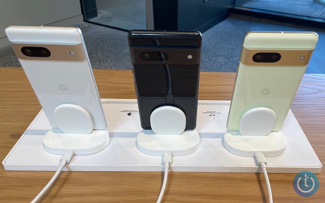 Three Google Pixel 7 models with the back showing. From the left in white, black, and yellow.