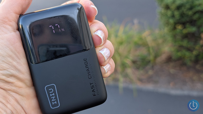 INIU Pocket Rocket P50 is shown in a hand for scale