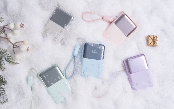 INIU Pocket Rocket P50 in (clockwise from the left) light white, light pink, light purple, light blue, and light green.