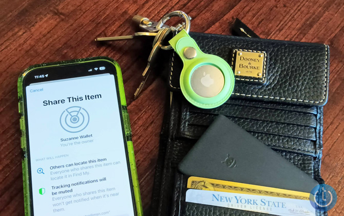 iPhone 14 Pro showing the share device screen in the Find My App. You can see Suzanne's Wallet is being shared. On the right, you see the Pebblebee Card sticking out of the wallet and an AirTag attached to a key ring.