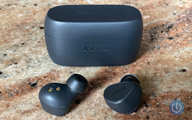 Jabra Elite 3 out of case with case on granite surface