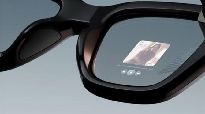 Closeup of the Meta Ray-Ban Display showing a video playing with controls.