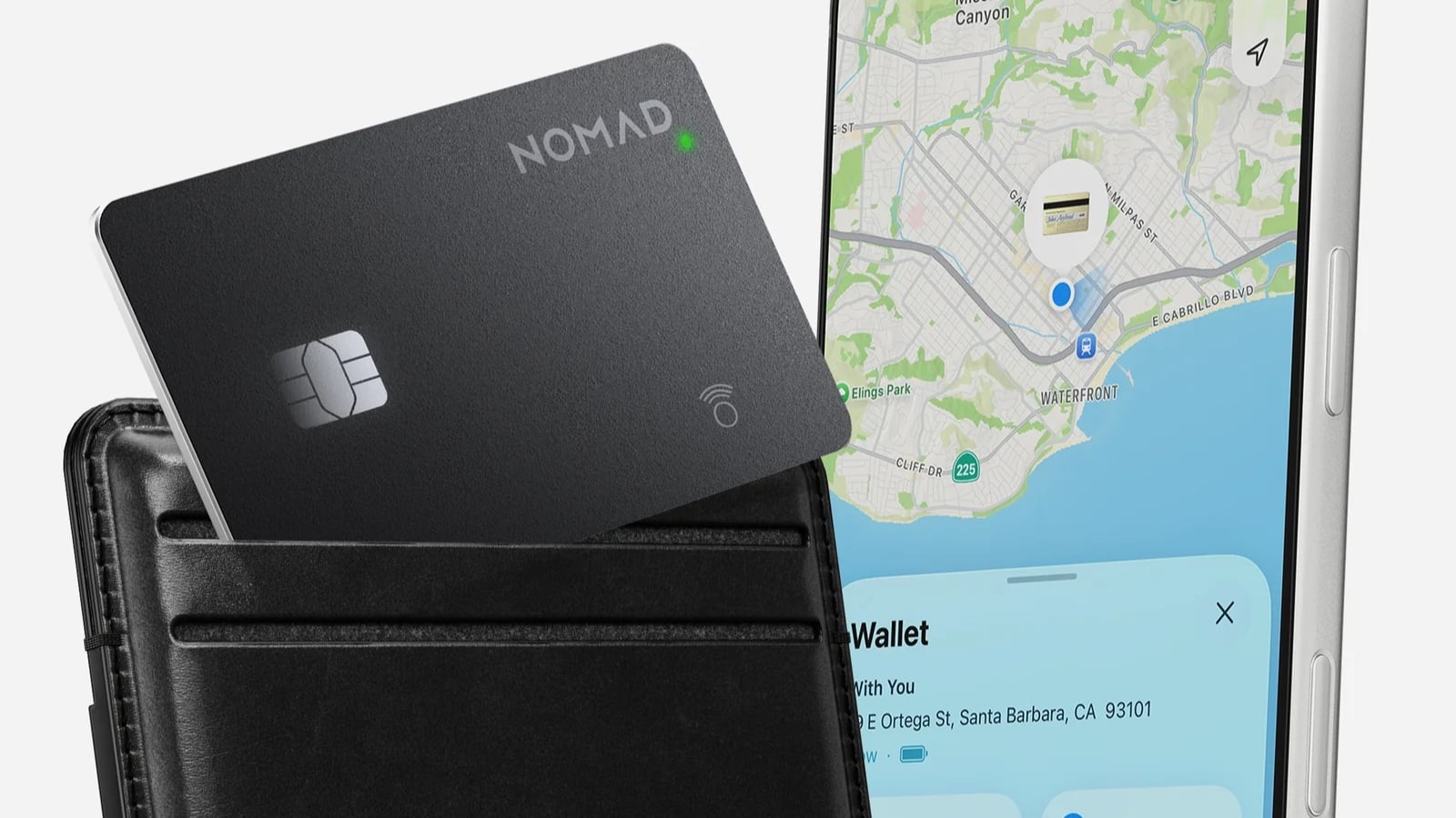 Nomad Tracking Card in a wallet with a phone next to it