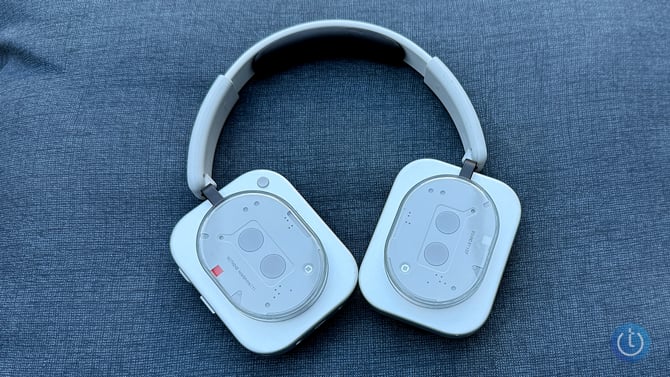 Nothing Headphone 1 are shown with the earcups up.
