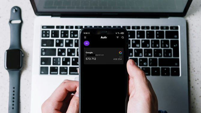 A phone shows the Ente Auth two-factor identification app.