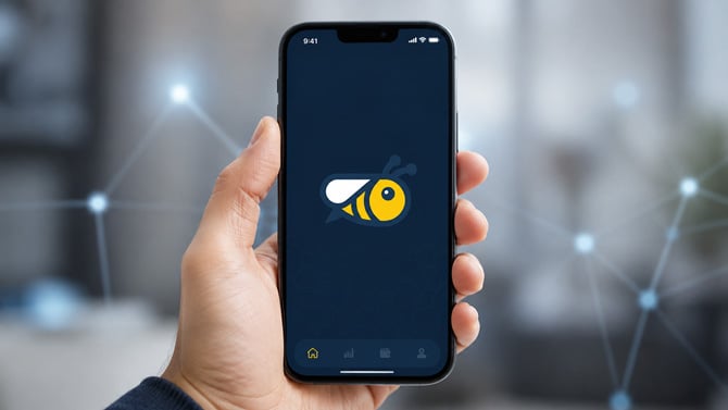 Concept image of a phone with the Honeygain bee on the screen.