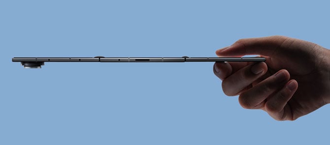 Samsung Galaxy Tri Fold phone shown from the side open with the camera bump on the bottom.