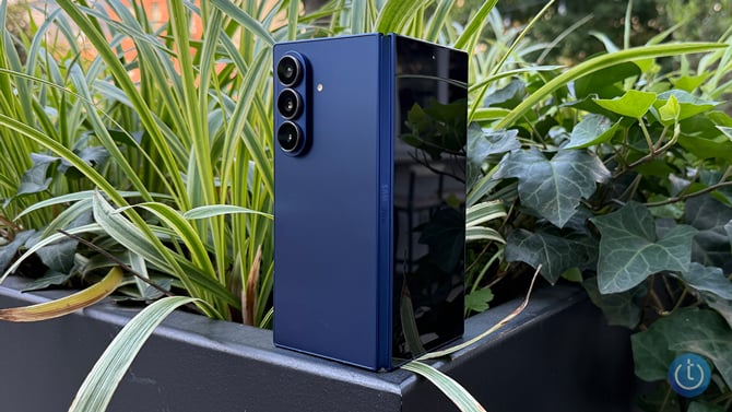 Samsung Galaxy Z Fold7 is shown from the back half folded.