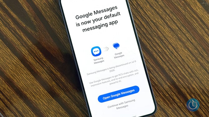 A Samsung Galaxy S24 phone shows the notification that Google Messages is now the default messaging app.