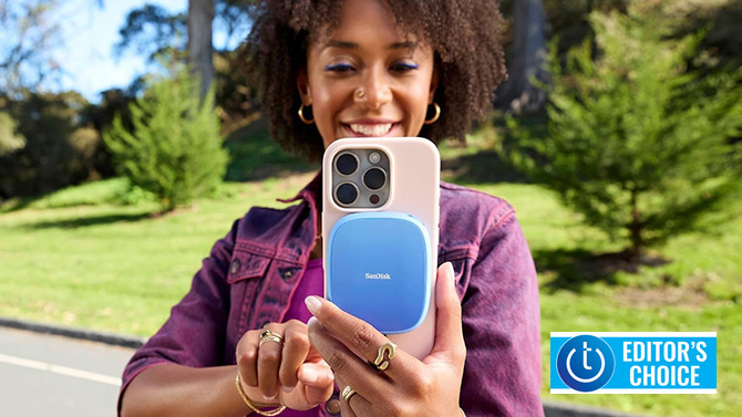 the SanDisk Creator Phone SSD is shown attached to an iPhone while a person takes a photo. The Techlicious Editor's Choice logo is in the lower right corner.