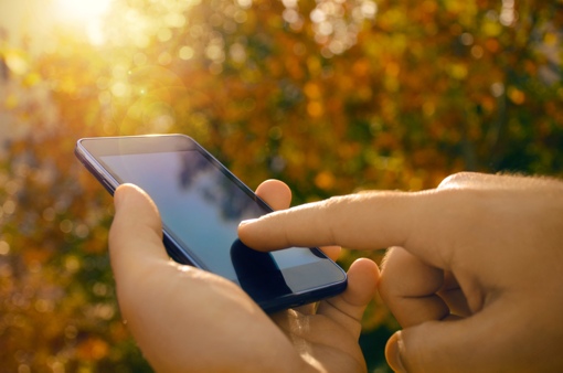 generic smartphone being used outdoors