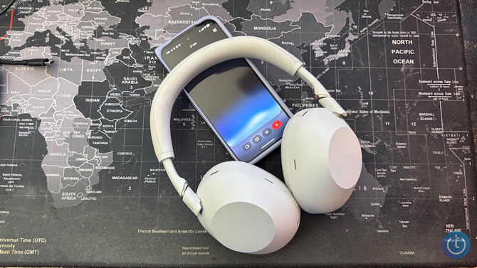 Sony WH-1000XM6 headphones shown with the Google Pixel 10 Pro Fold on a map.
