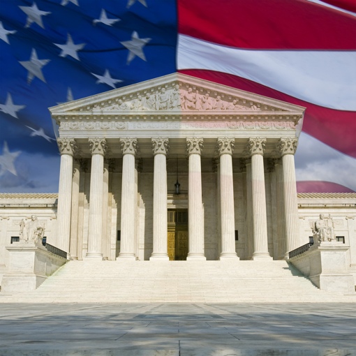 U.S. Supreme Court building w/flag background