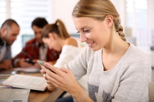 Teen using smartphone