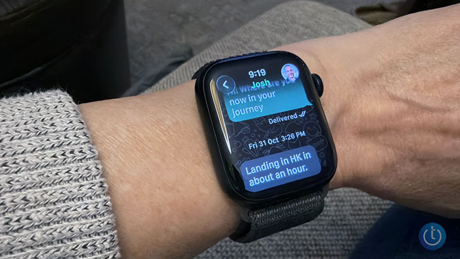 An Apple Watch shows the WhatsApp app
