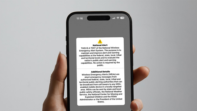 Phone showing a test message for the National Wireless Emergency Alert System.