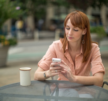 Woman with white iPhone